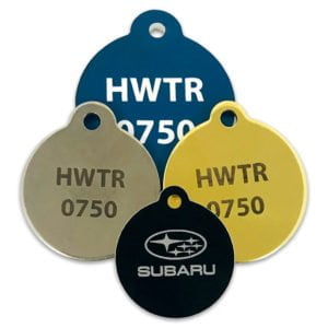 round engraved tags with hole through tab at top